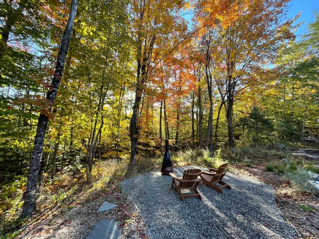 Bijou de design unique dans un environnement paradisiaque à 2 pas d'un lac