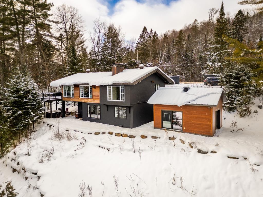 Bijou splendidement rénové au bord d'un lac