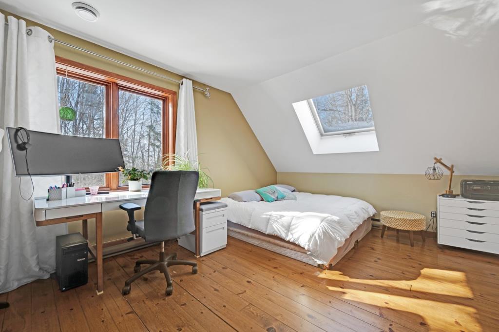 Maison au charme unique nichée dans un écrin boisé de 69 000 pi²