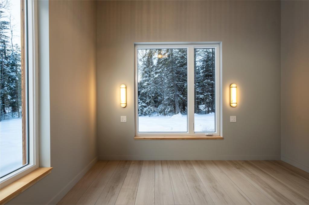 Bijou contemporain niché sur un site féérique au cœur des Laurentides