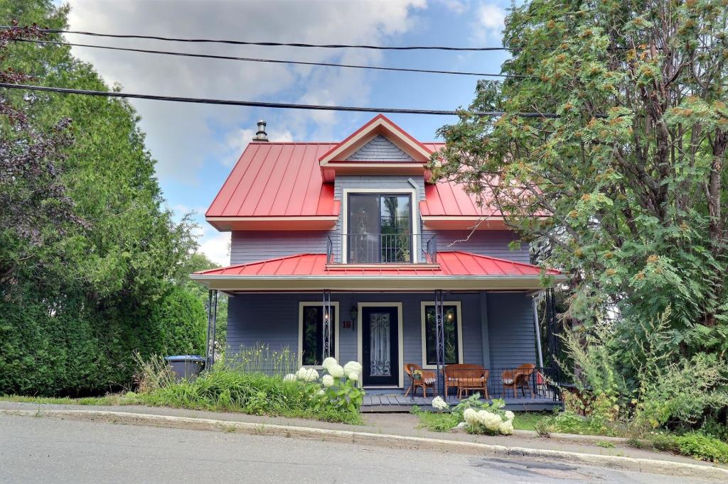 Cottage au cachet chaleureux et lumineux à vendre pour 214 000 $