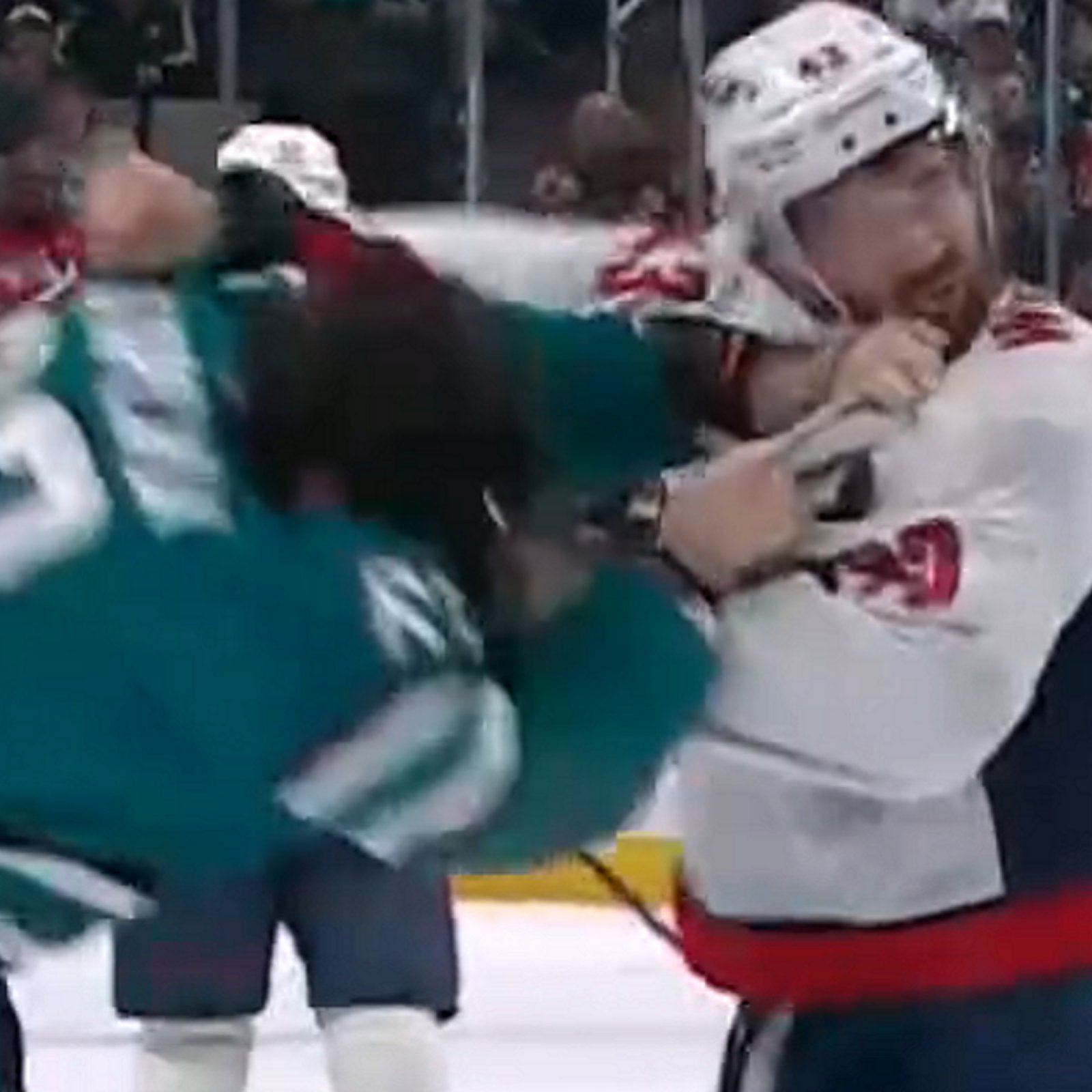 Tom Wilson beats the brakes off Zack Ostapchuk.