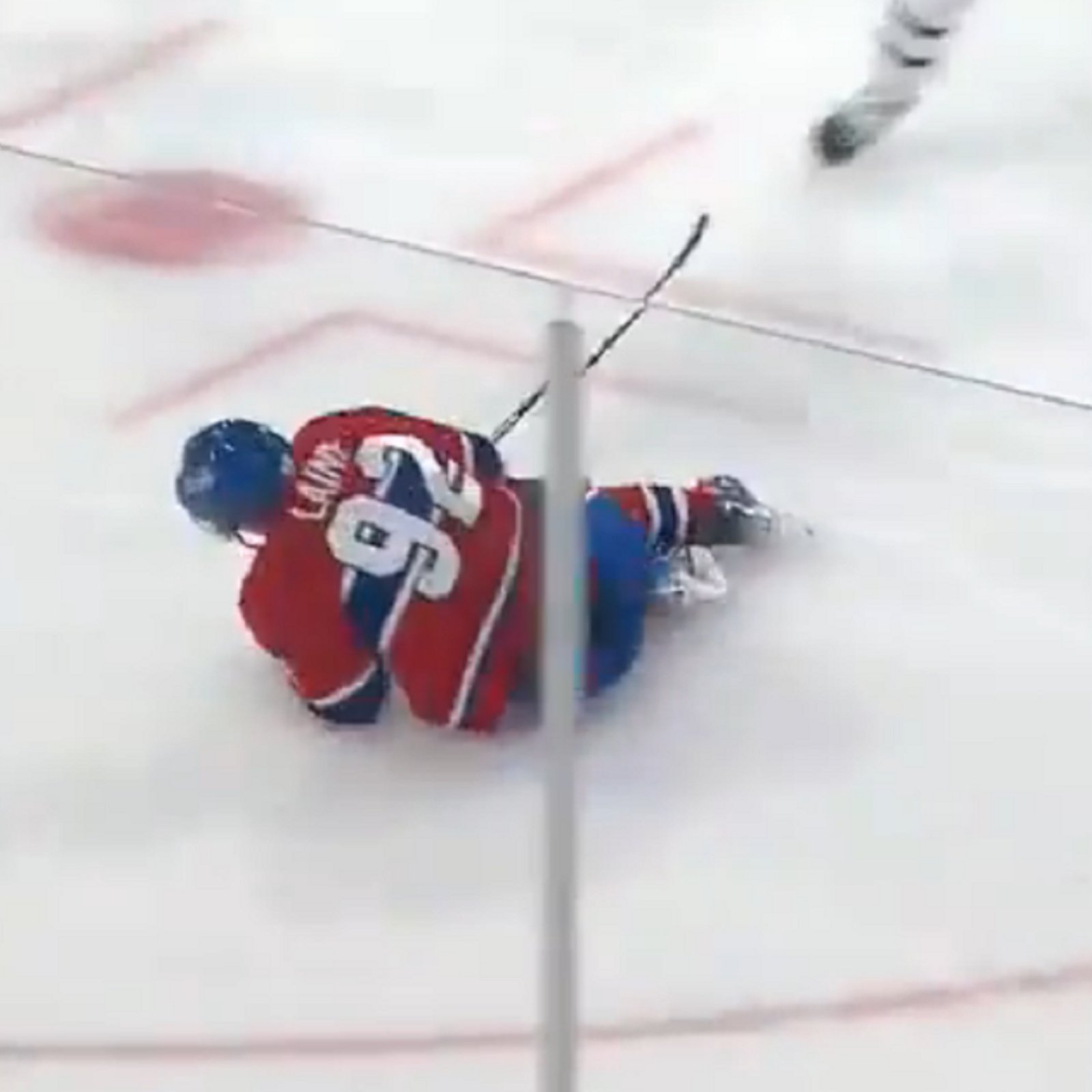 Habs teammate goes knee on knee with Patrik Laine at practice.