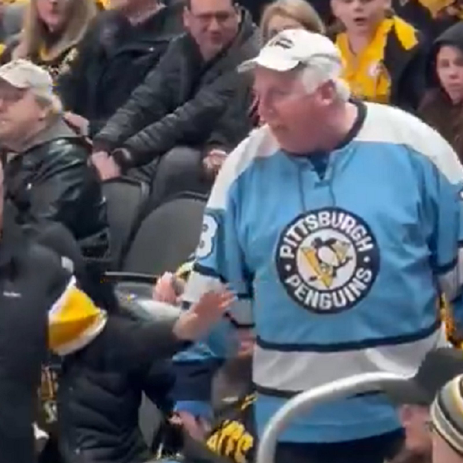 Penguins fan humiliated after trying to steal from a kid.