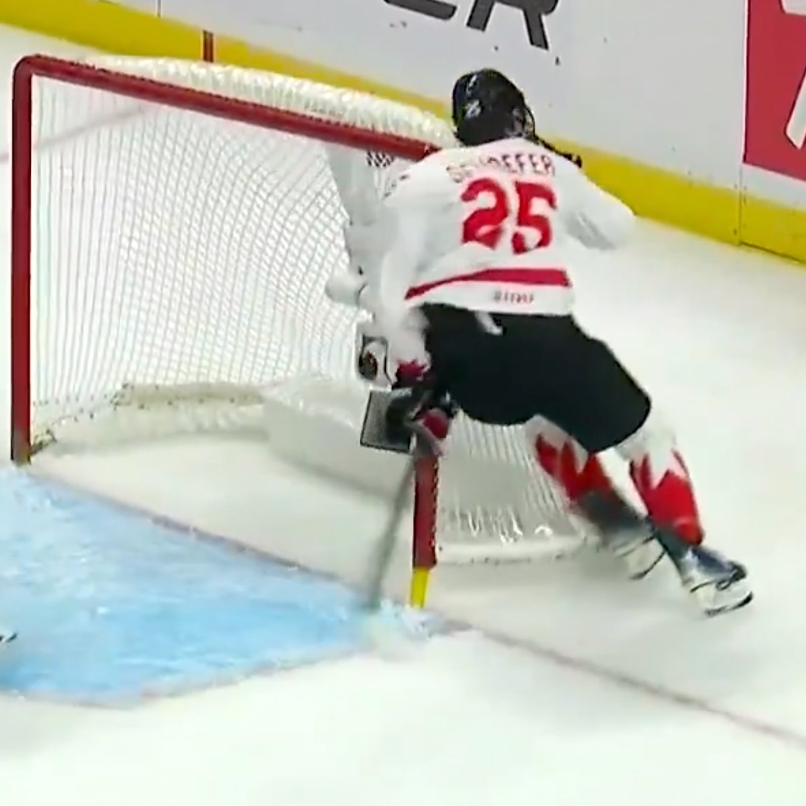 Canada’s Matthew Schaefer runs into goal post at full speed, leaves game in pain