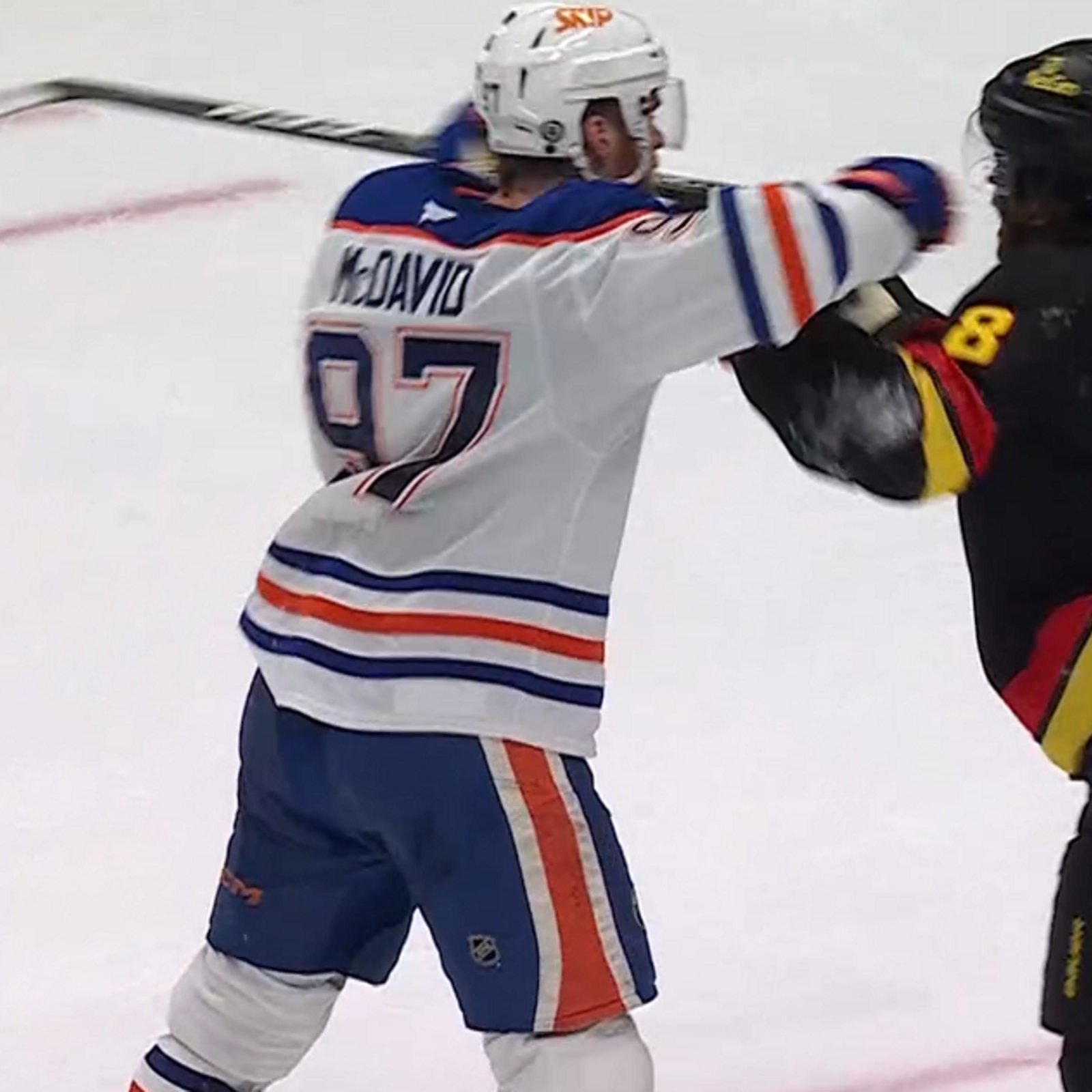 Connor McDavid delivers vicious crosscheck to the head of Conor Garland.