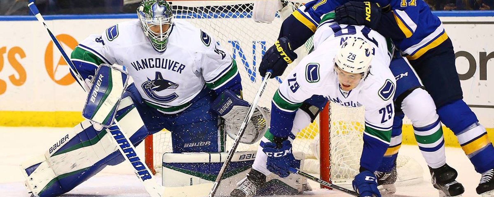 Canucks cut mammoth defenseman, two others clear waivers