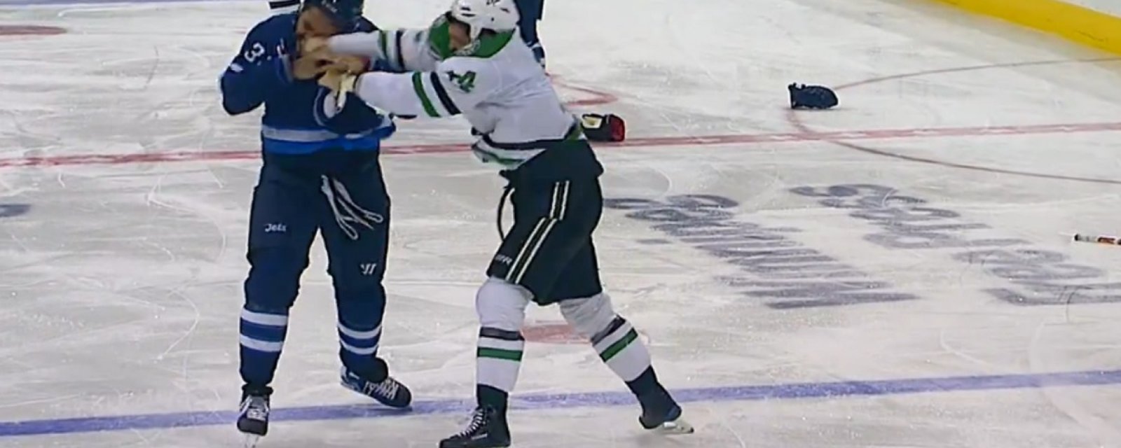 Breaking: Dustin Byfuglien &amp; Jamie Benn drop the gloves and throw heavy punches.