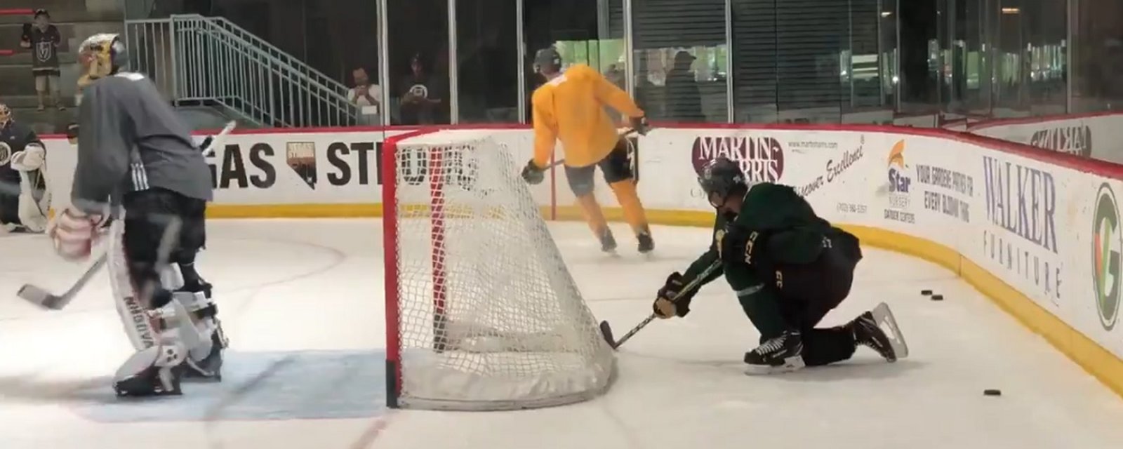 Ryan Reaves hides behind the net at practice &amp; hilariously impersonates the goal horn.