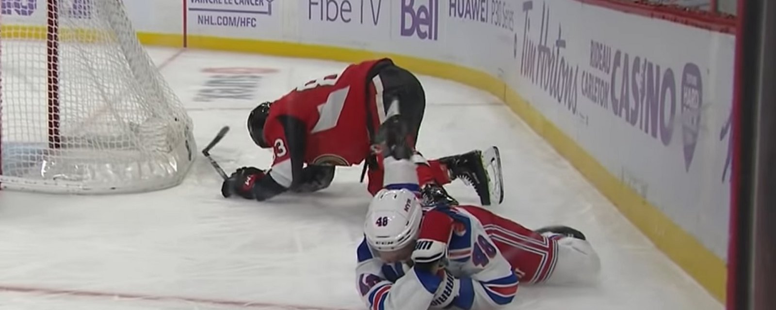 Brendan Lemieux loses his teeth after getting hit in the face by Christian Jaros.