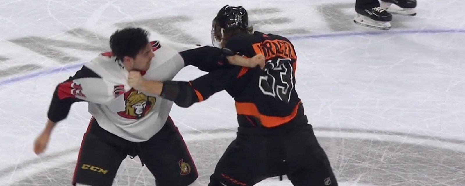 Jakub Voracek drops the gloves with Nick Paul after a huge hit on Travis Konecny.