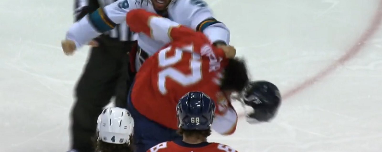 Evander Kane goes after MacKenzie Weegar after a big hit from Weegar.