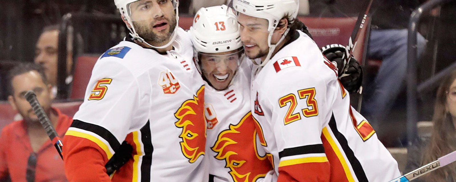 Johnny Gaudreau hits the ice with the Monahan and Lindholm on Sunday.