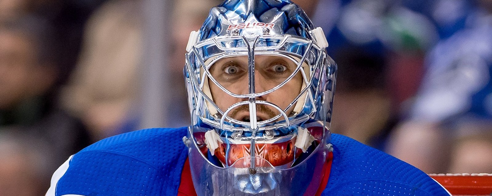 Henrik Lundqvist shows off his new Washington Capitals themed goalie pads.