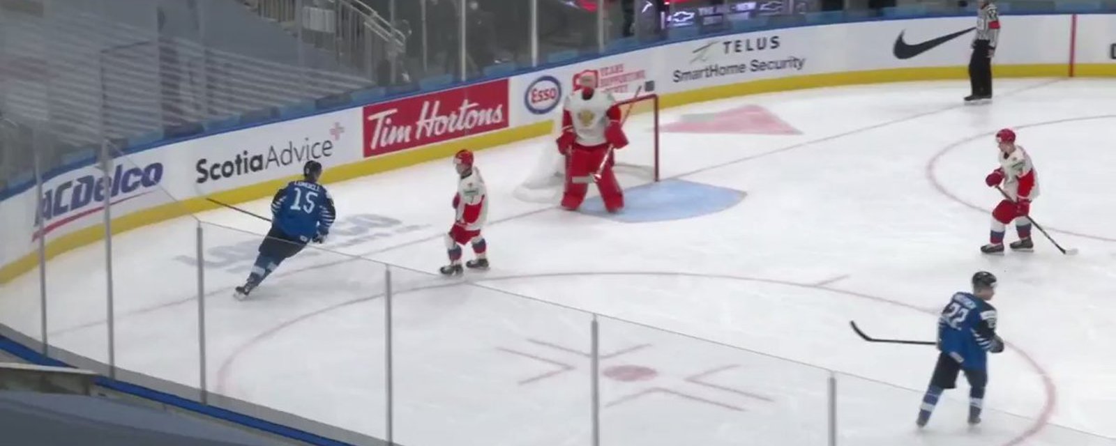 Referee Kyle Kowalski caught coaching Team Finland player on the ice! 