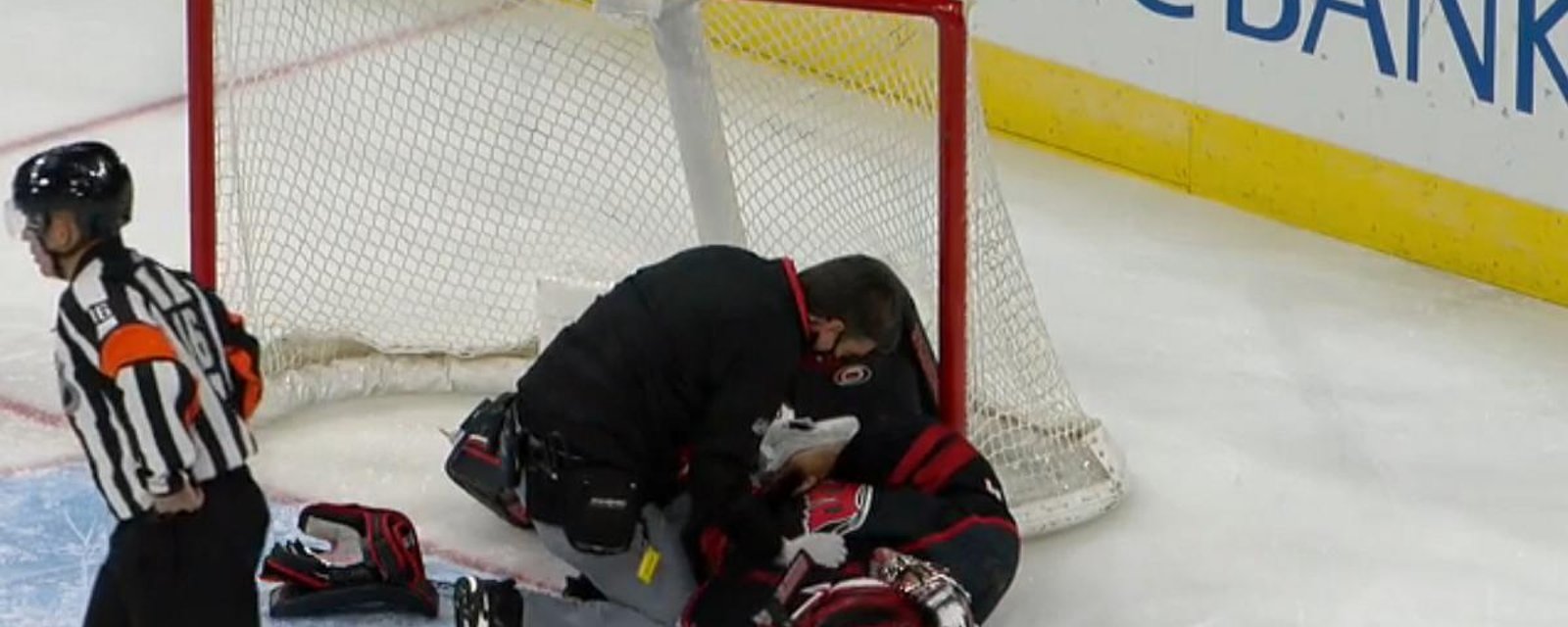 Petr Mrazek leaves the game after being pancaked in his own net.
