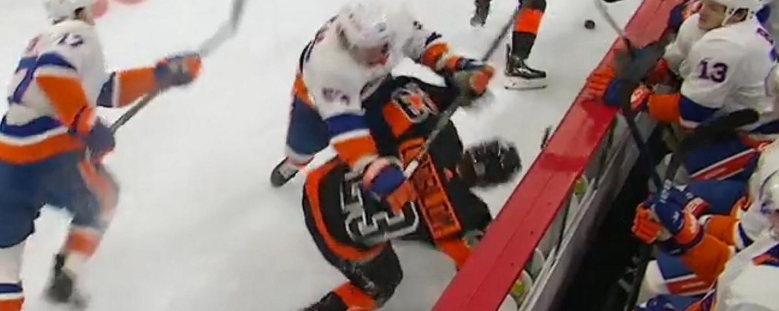 Casey Cizikas cross-checks Oskar Lindblom in the head.