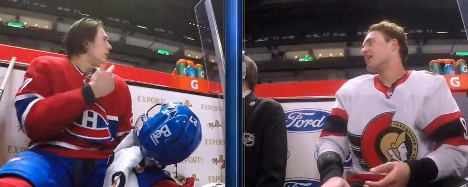 Josh Norris taunts Alexander Romanov in the penalty box.