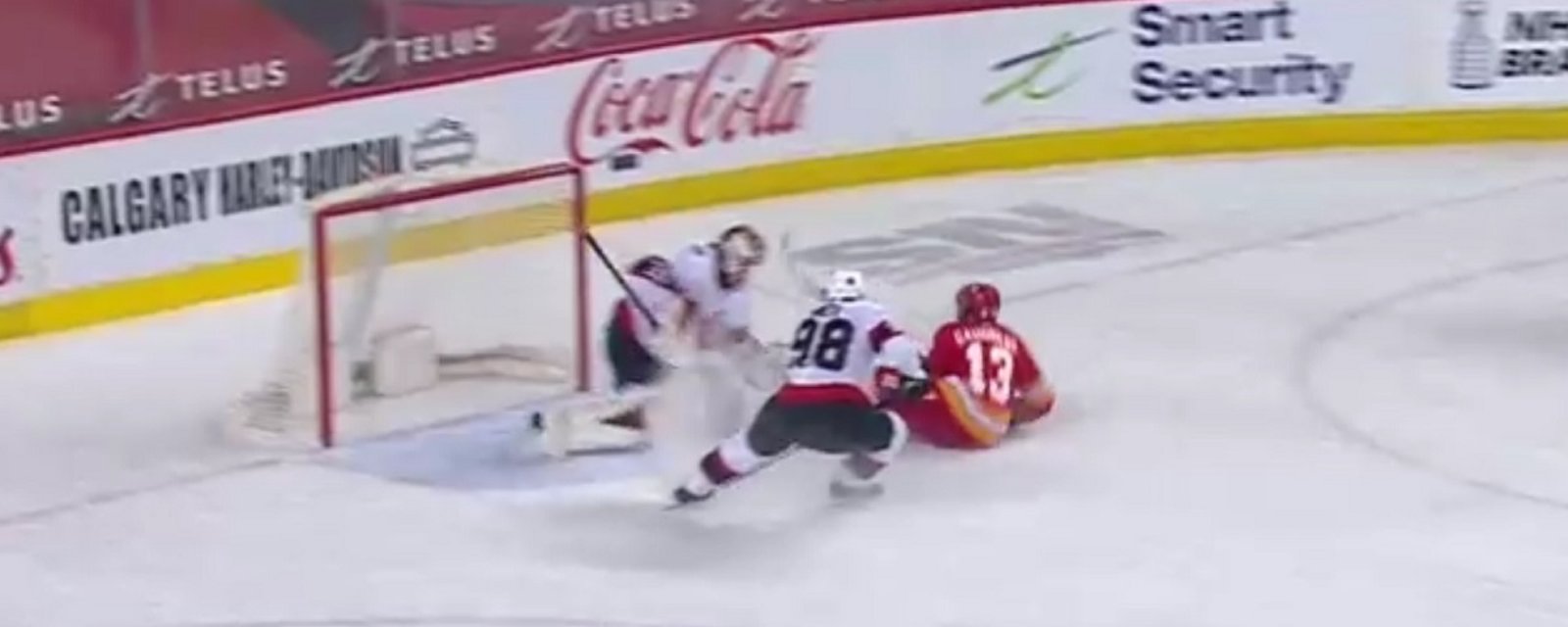 Johnny Gaudreau scores from his backside on the breakway.