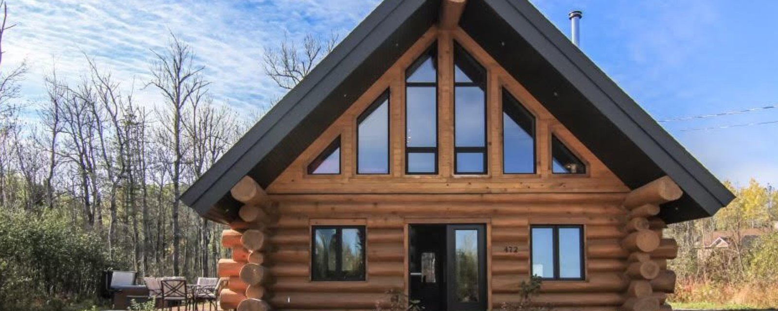 Superbe maison en bois rond vendue meublée