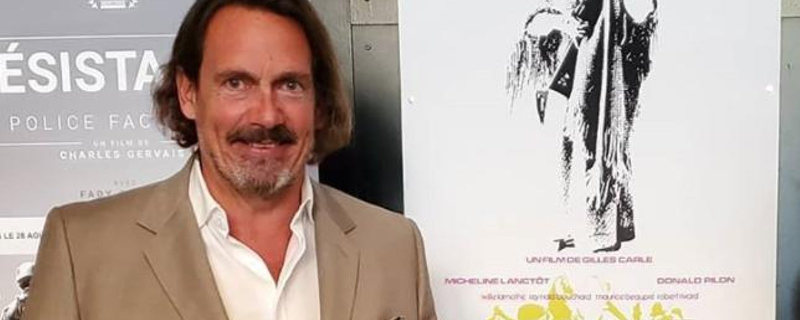 Pierre Karl Péladeau publie une adorable photo de sa fille aînée qui tient bébé Henri dans ses bras
