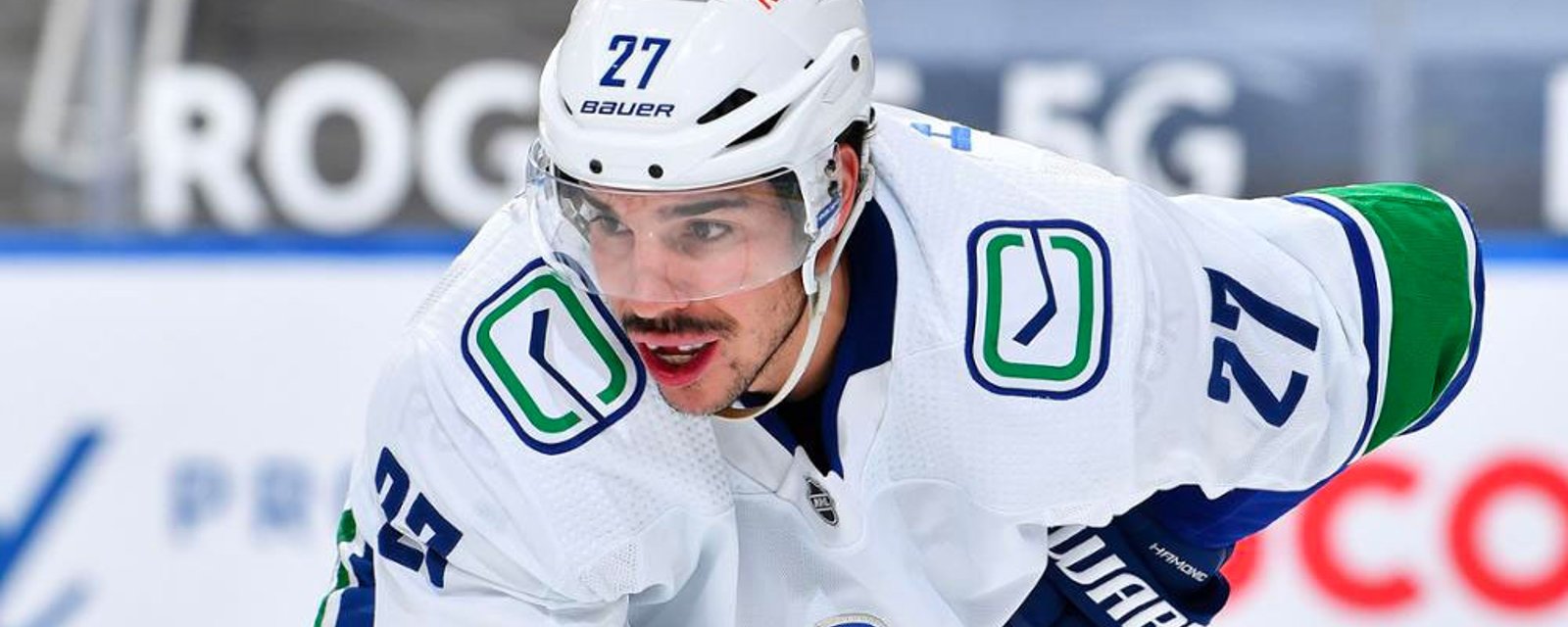Canucks demote Hamonic, still refuse to acknowledge his vaccination status