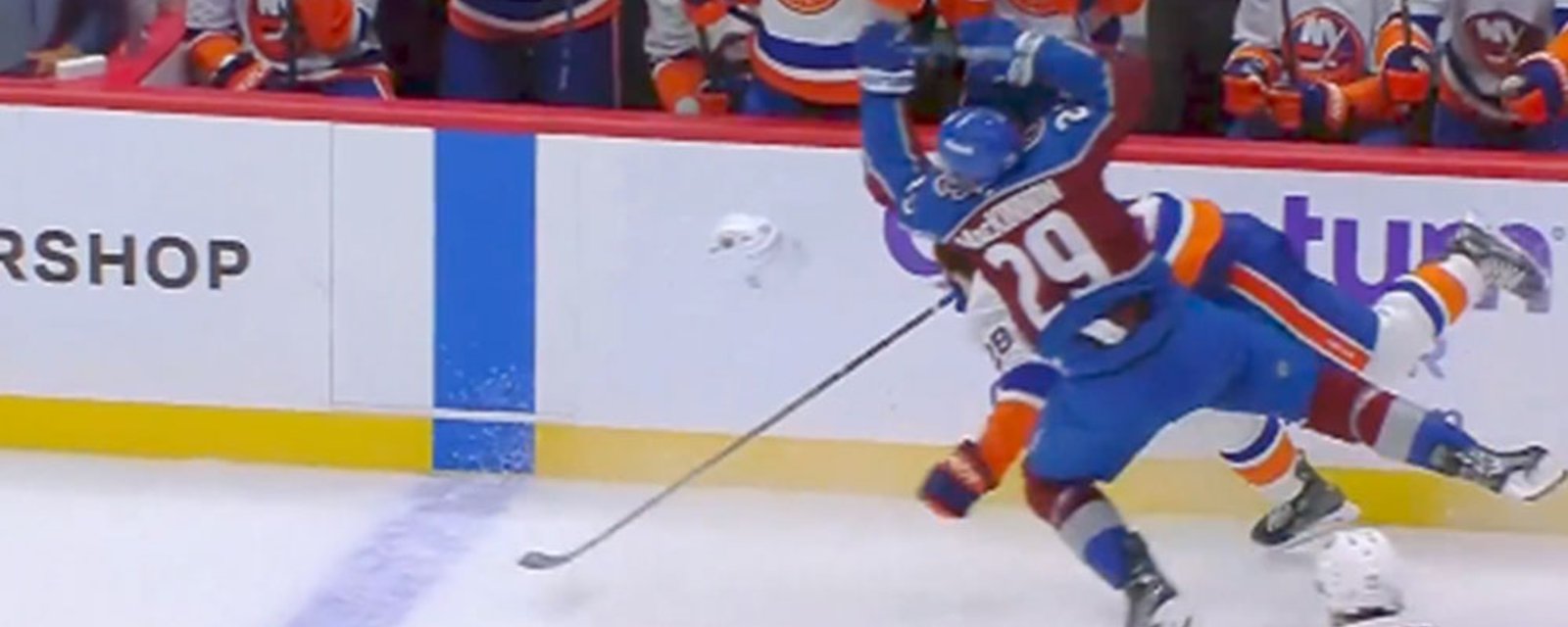 MacKinnon absolutely blows up Romanov with a huge hit, chaos ensues