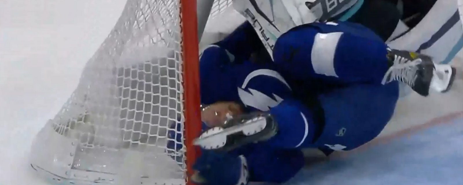 Katchouk takes a huge hit and goes head first into the post.