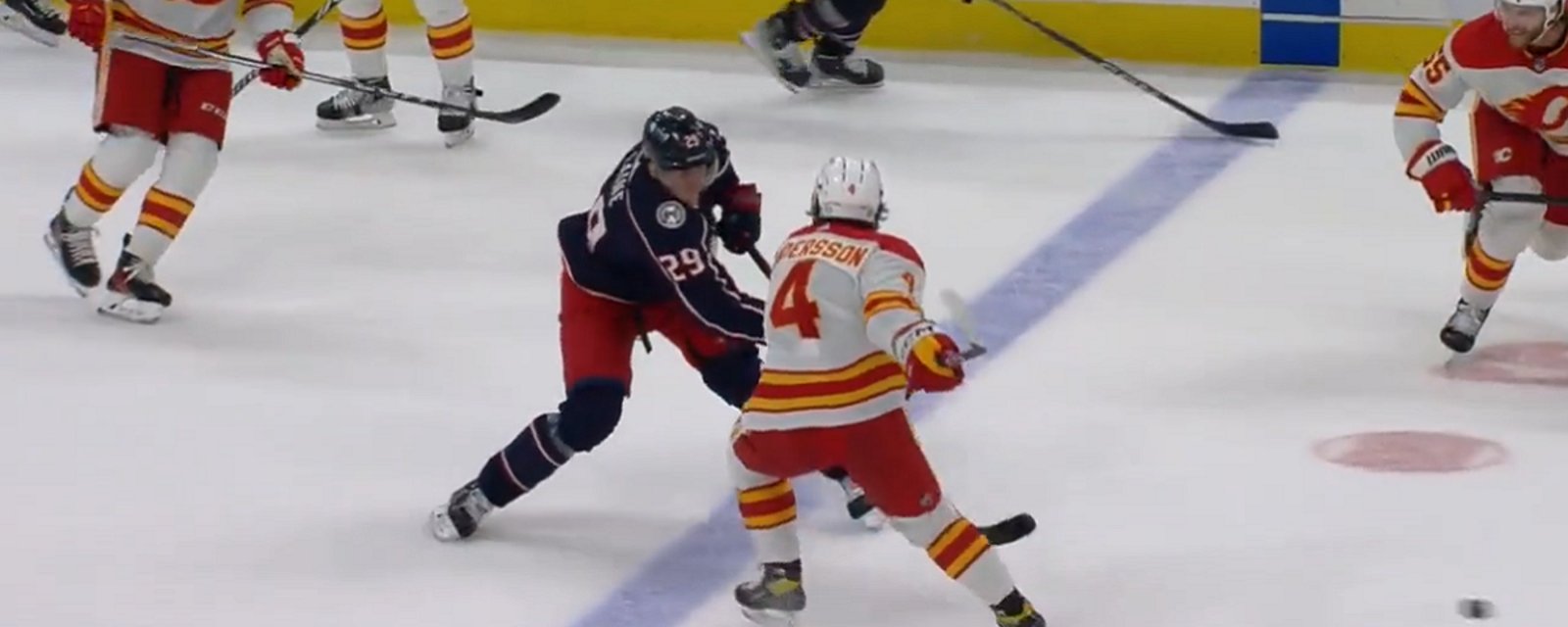 Rasmus Andersson tries to take Patrik Laine's head off.