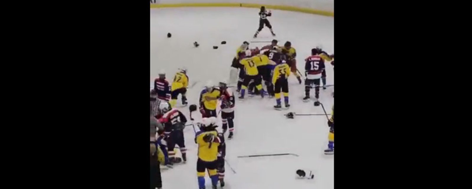 A brawl breaks out in handshake line at IIHF U18 Invitational