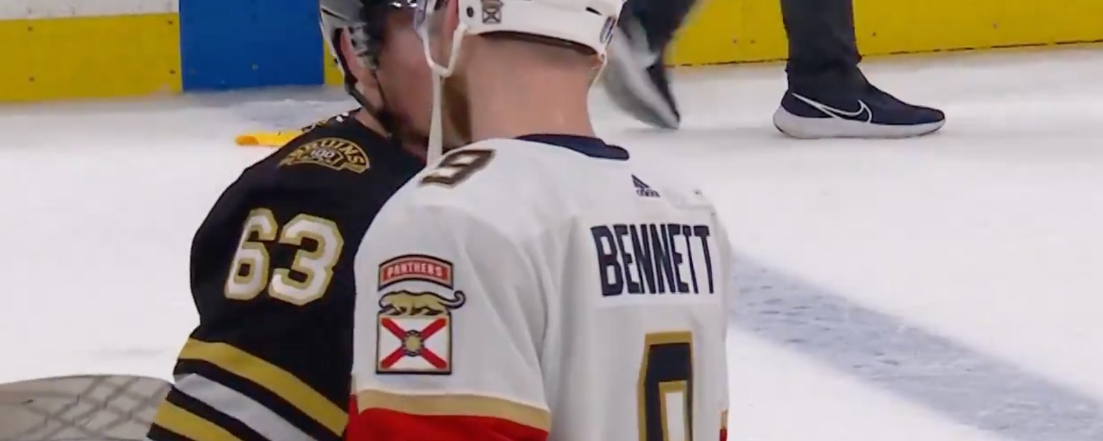 Brad Marchand has a word with Sam Bennett in handshake line