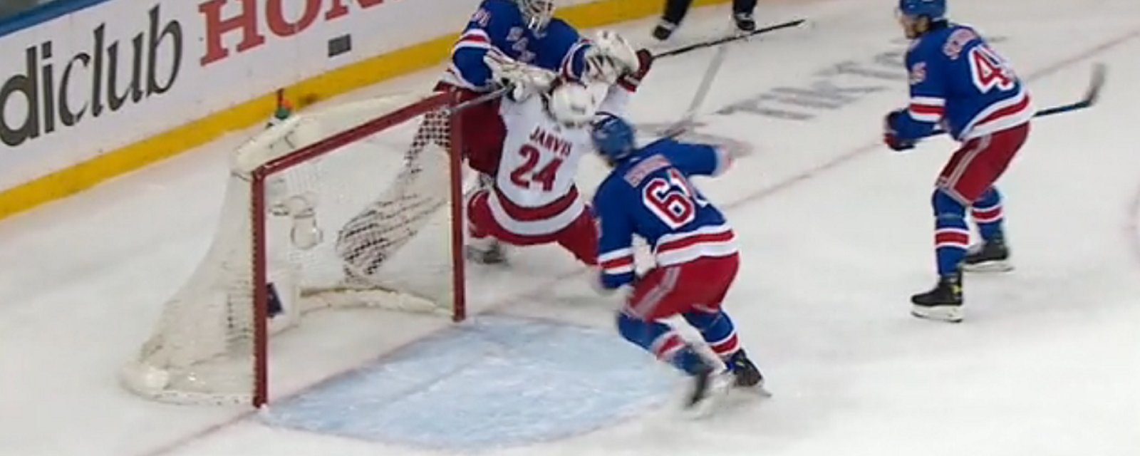 Shesterkin leaves his crease and hits Jarvis in Game 6.