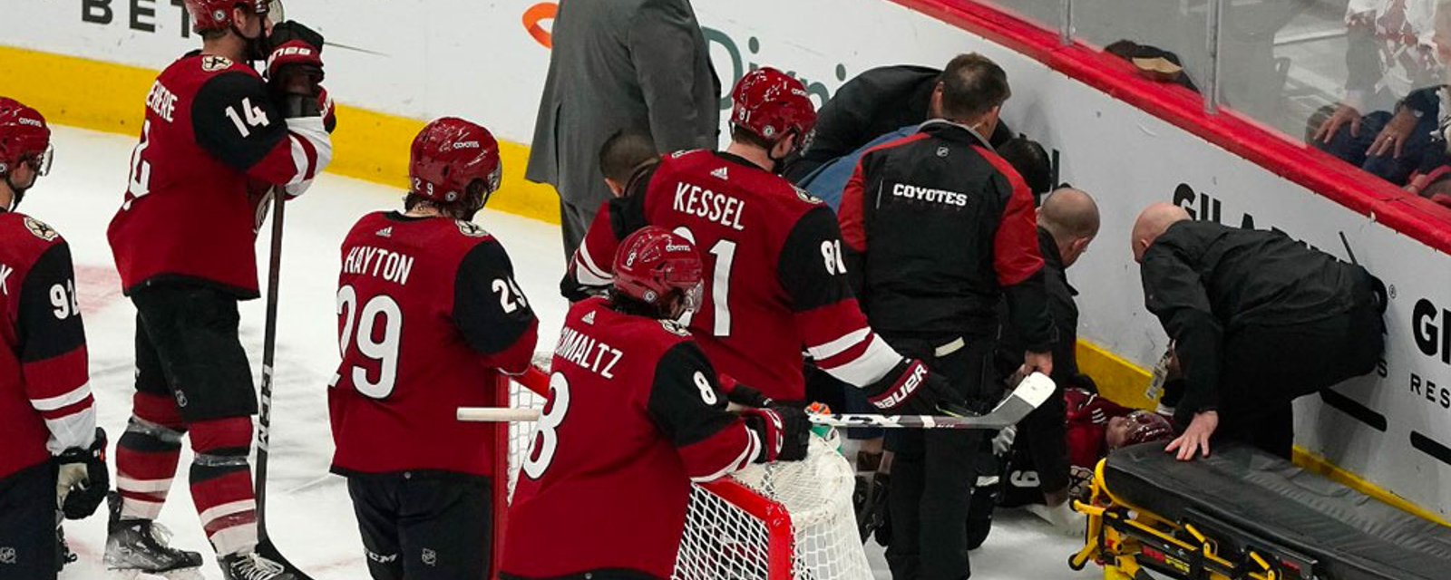 Coyotes forward Clayton Keller leaves on a stretcher after horrific fall into end boards