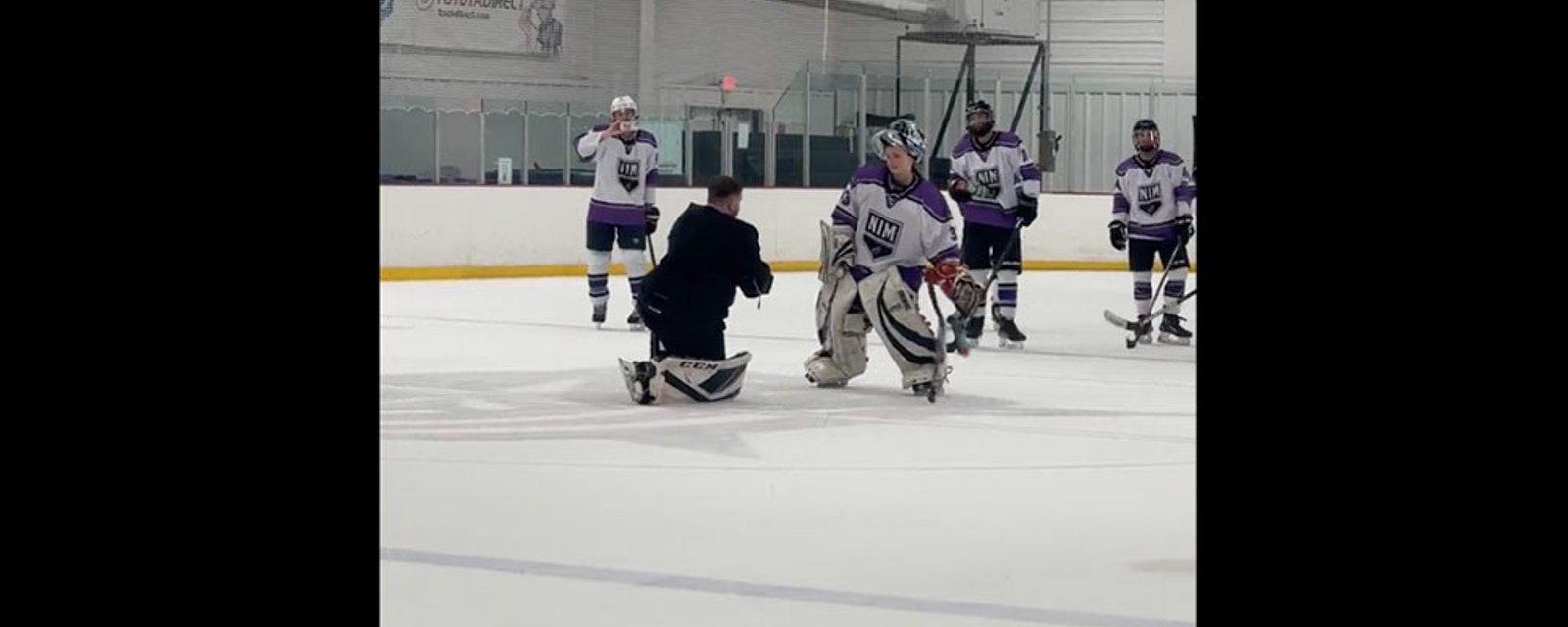 Goalie proposes to opposing goalie in handshake line