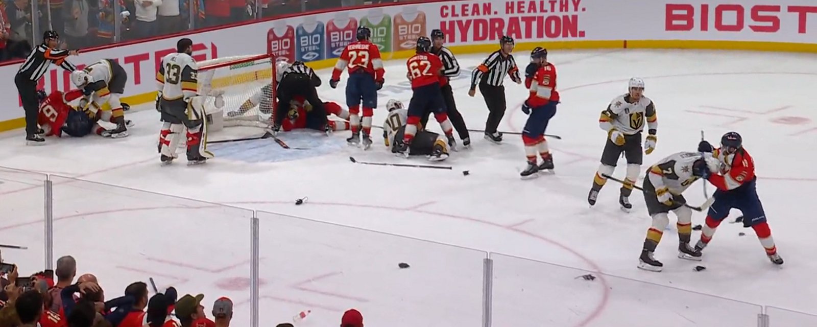 Chaos erupts on the ice after the final whistle in Game 4.