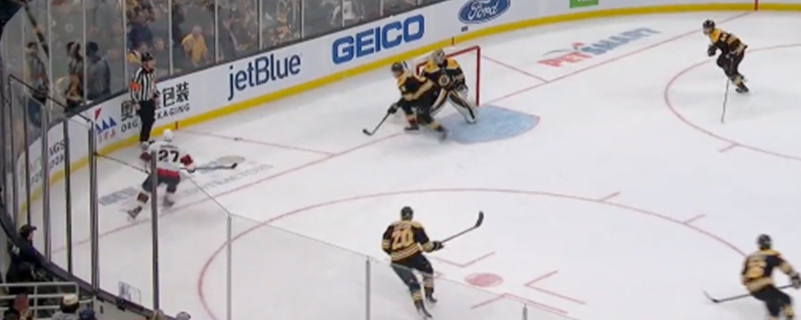 Referee literally kicks a perfect pass to Bruins defender... on purpose