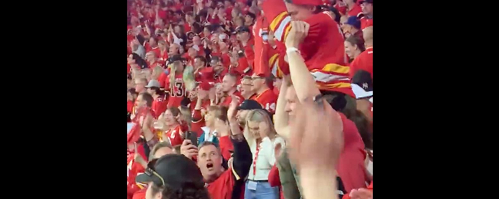 Brady Tkachuk celebrates Flames OT win by hoisting a Matthew Tkachuk fan on his shoulders and running up and down the arena stairs