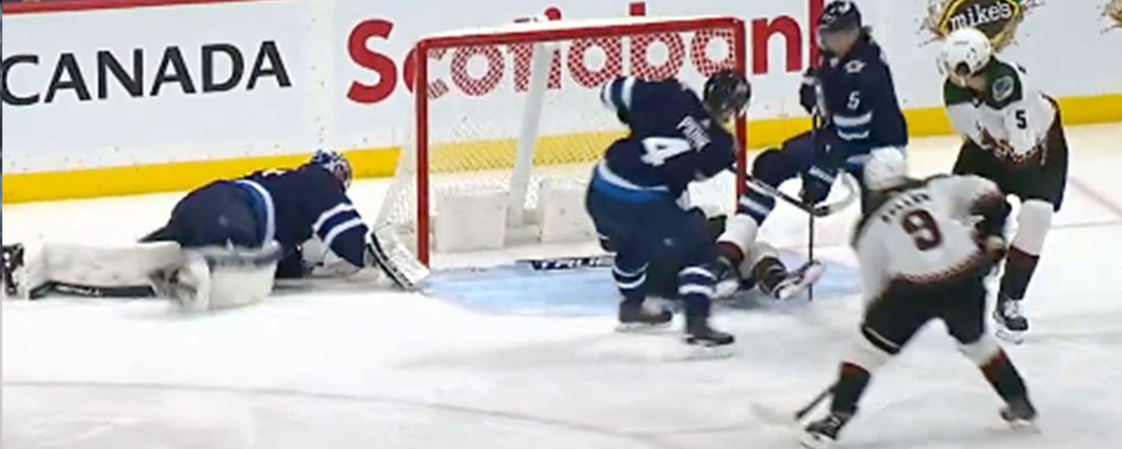 Connor Hellebuyck makes an absolutely ridiculous desperation save