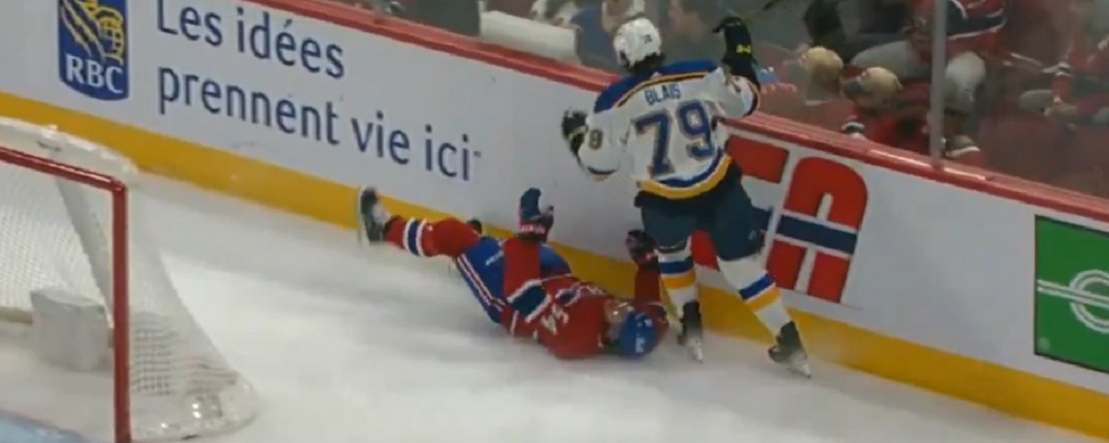Harris hurt bad after Blais nearly takes his head off.