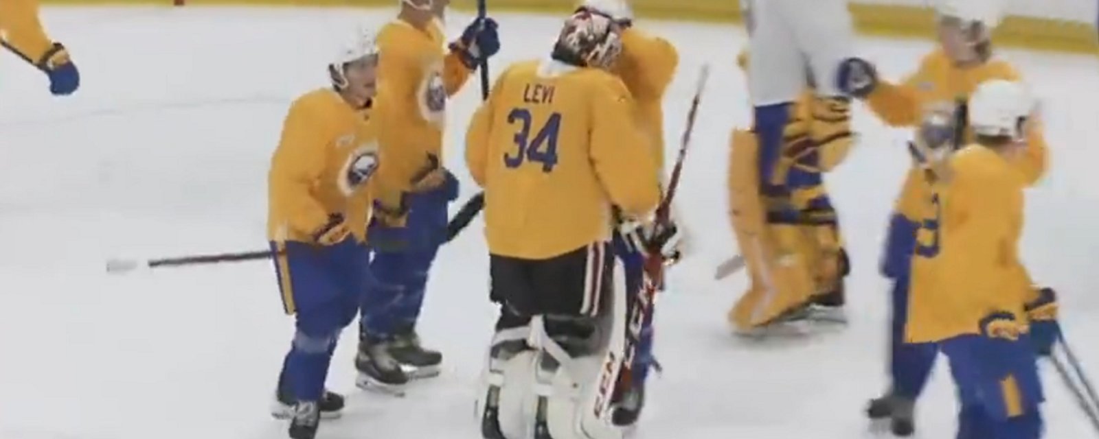 Devon Levi mobbed by teammates after insane save in development camp.