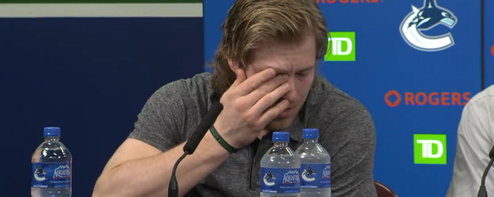 Brock Boeser breaks down in tears at end of season press conference.