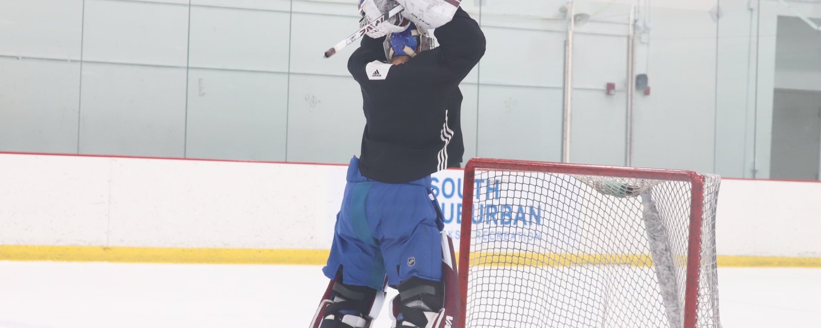 Goalie Darcy Kuemper breaks his stick during practice