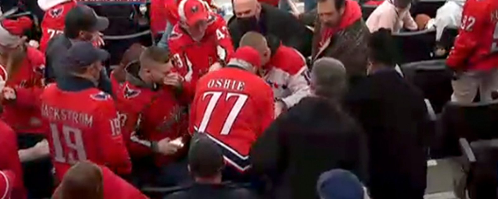 Game is delayed in D.C. after a fan gets hit by puck, requiring immediate medical attention