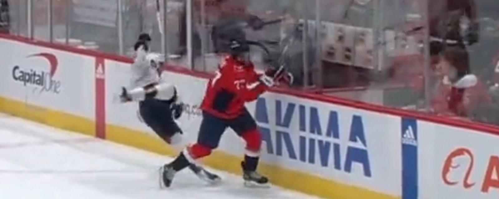 T.J Oshie welcomes Adam Fantilli to the NHL with a big hit.