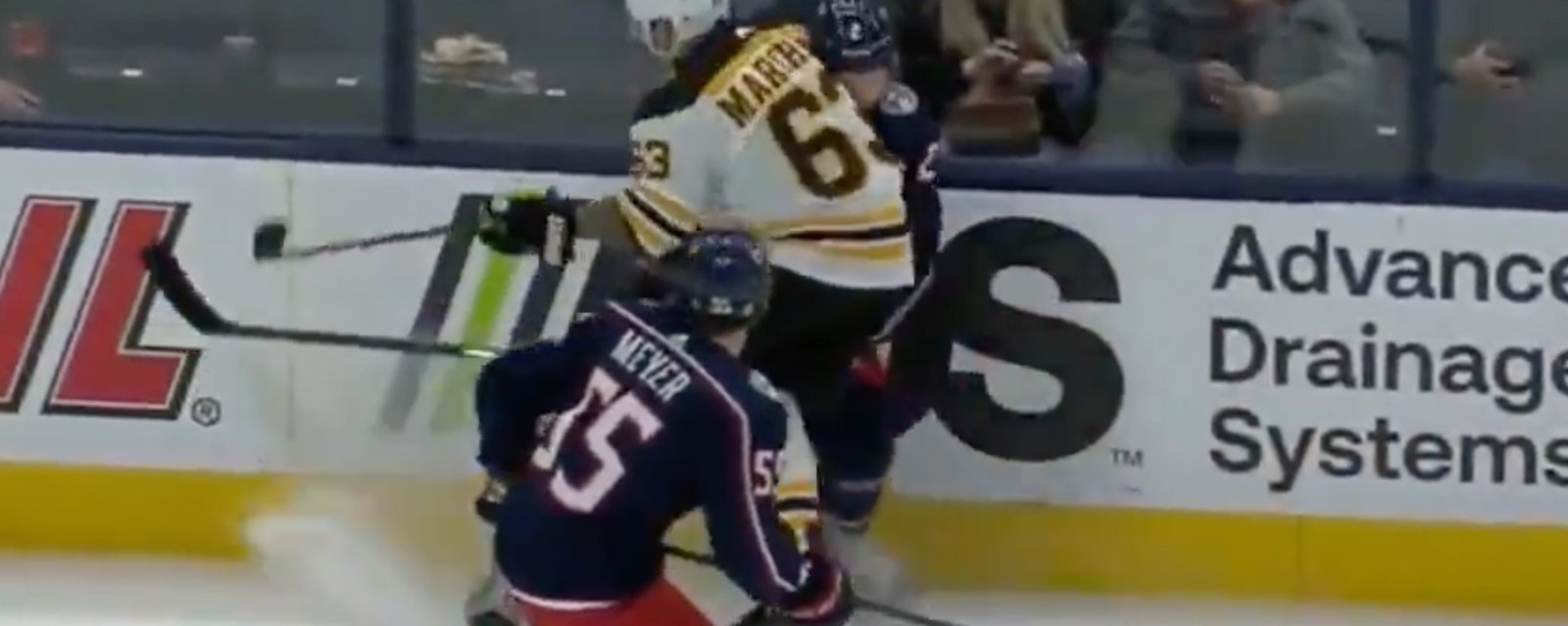 Brad Marchand injures Andrew Peeke with huge hit to the head!