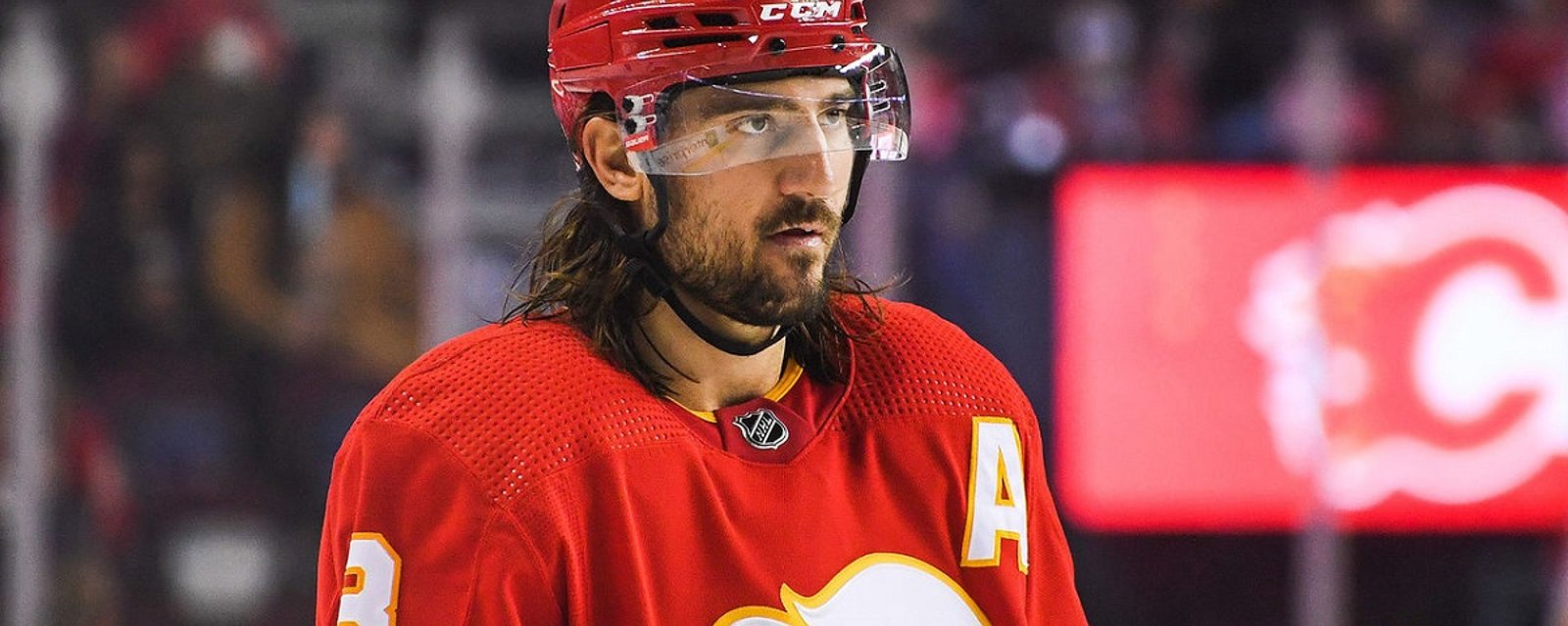 Flames set firm asking price for Chris Tanev trade.