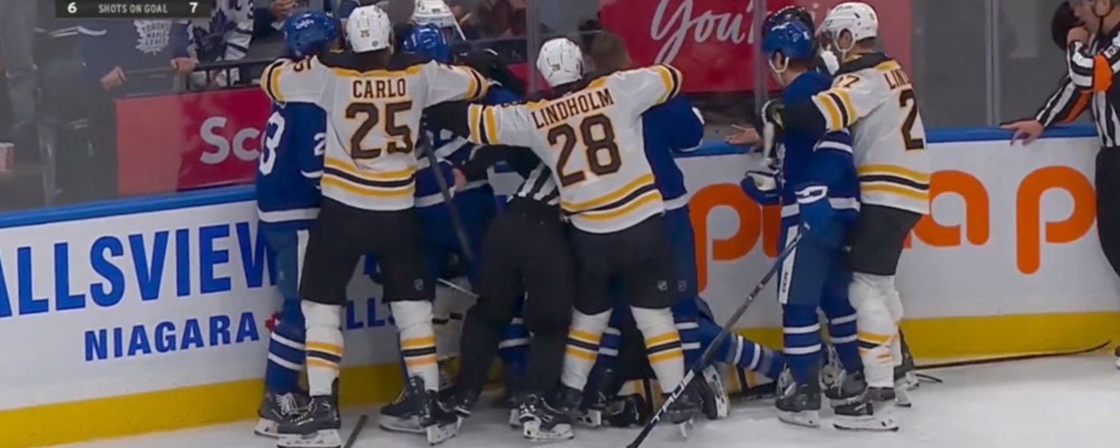 Tanev absolutely drills Pastnak along the boards, so Marchand jumps Tanev and all Hell breaks loose! 