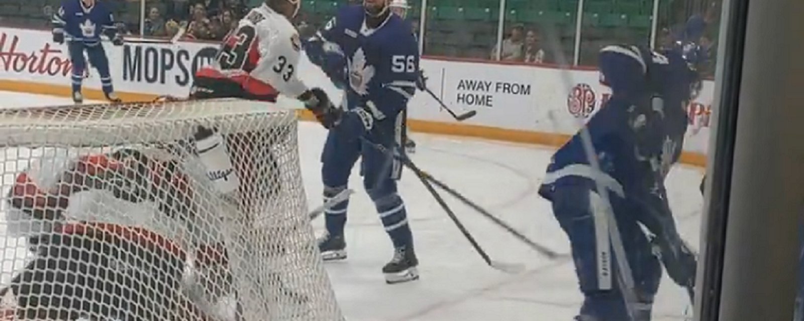 Maple Leafs forward Cedric Pare catches another beatdown.