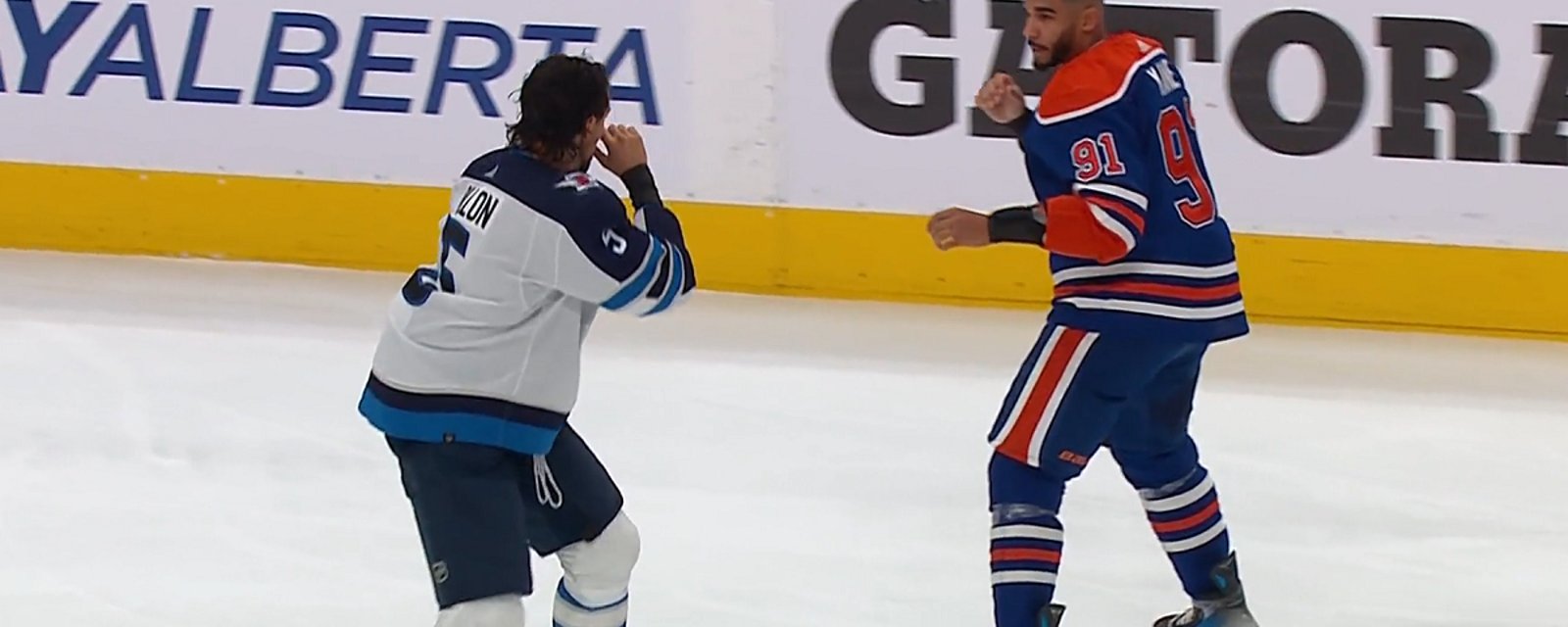 Evander Kane and Brenden Dillon drop the gloves on Saturday night.