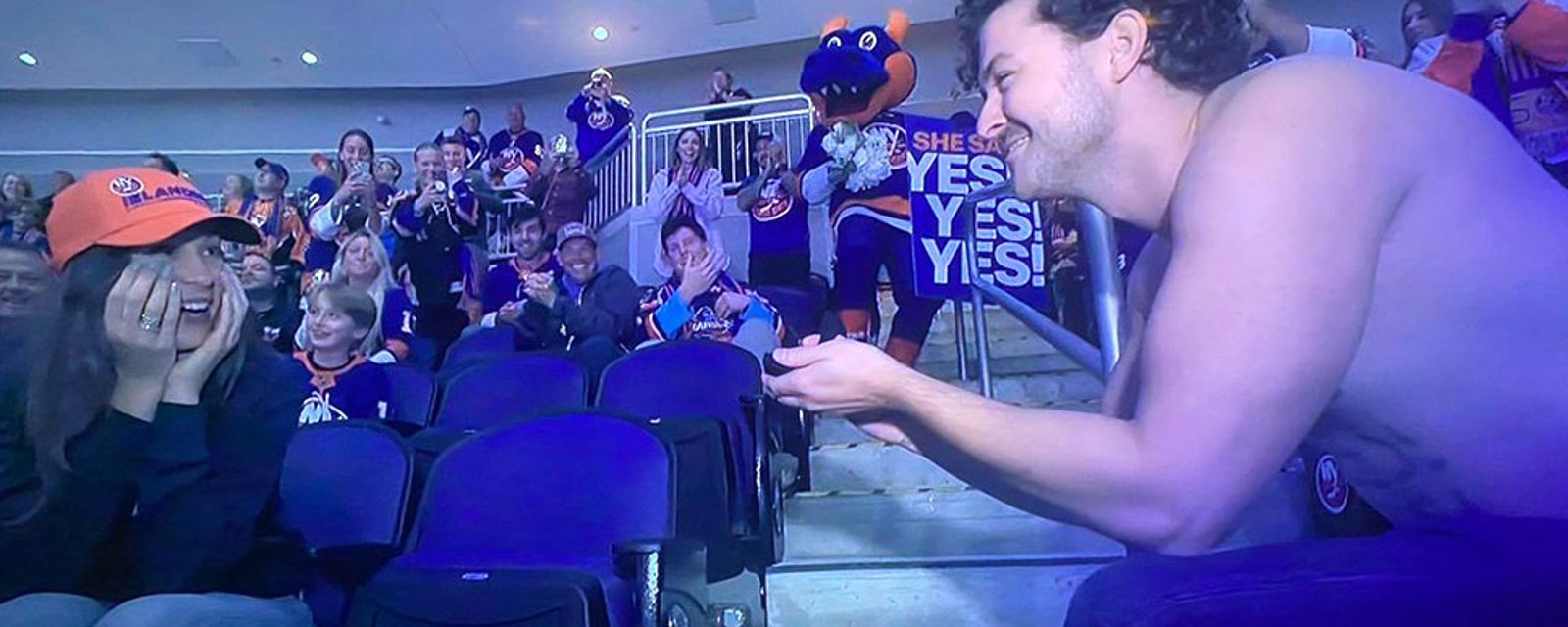 Mortified girl rejects shirtless boyfriend's marriage proposal during Islanders game
